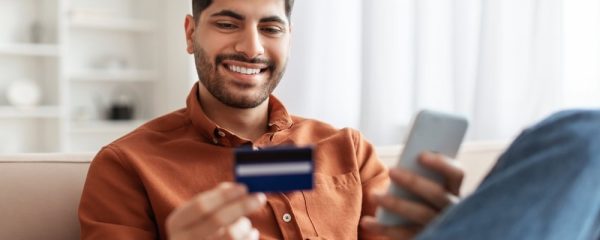 Internet,Mobile,Shopping,Concept.,Positive,Middle,Eastern,Man,Using,Cellphone